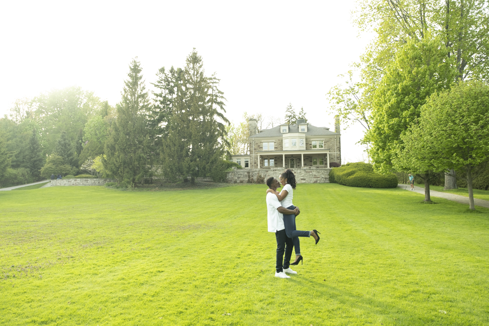 Historic mansion engagement session in Ontario. On the lawn. 