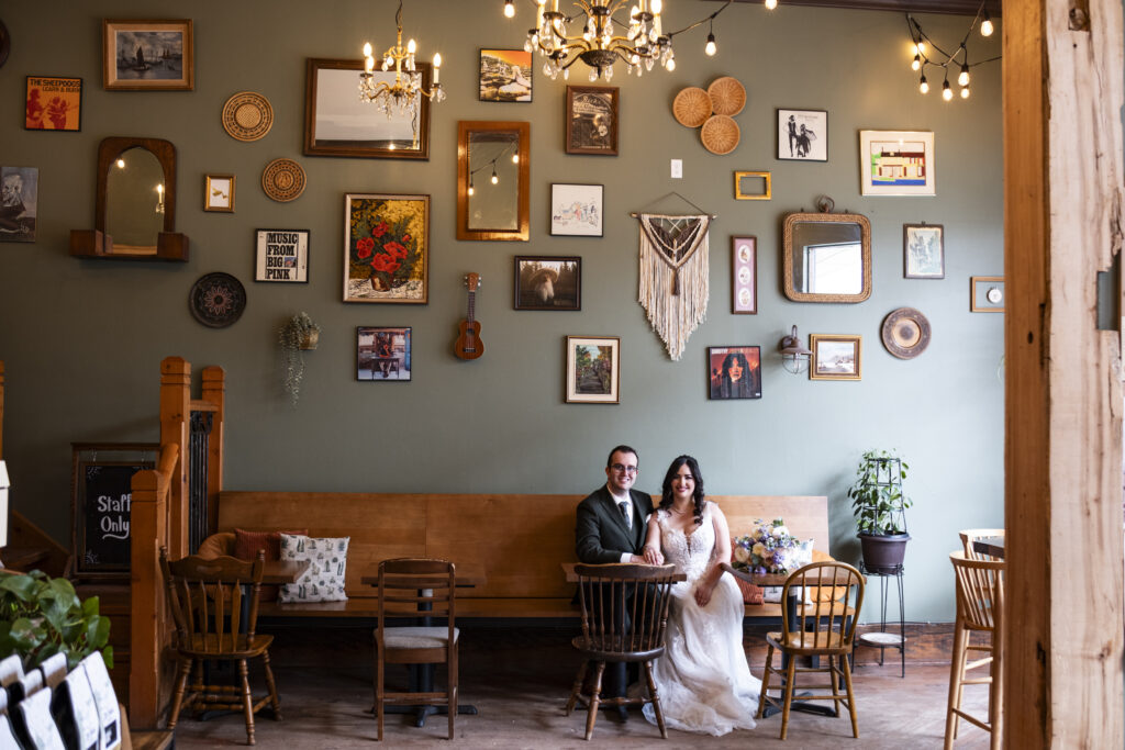 The bride and groom take a break at a local shop near the Elora Mill in Elora, Ontario. 