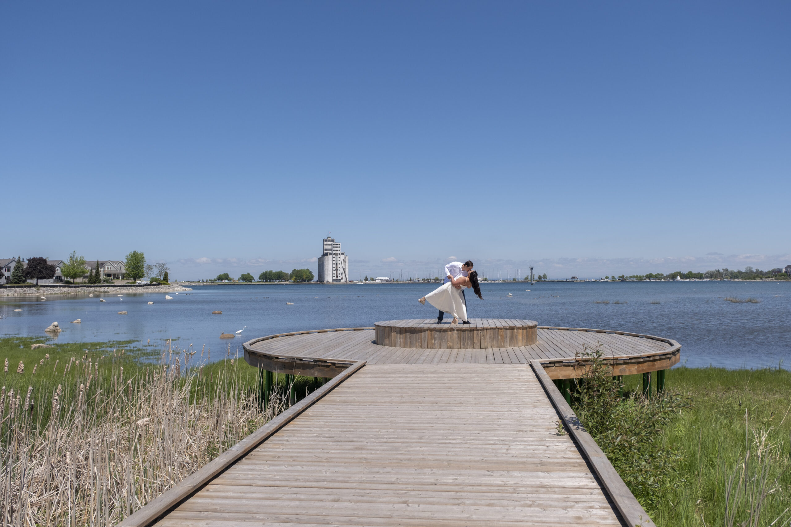 A couple dips during their engagement session in Collingwood, Ontario.