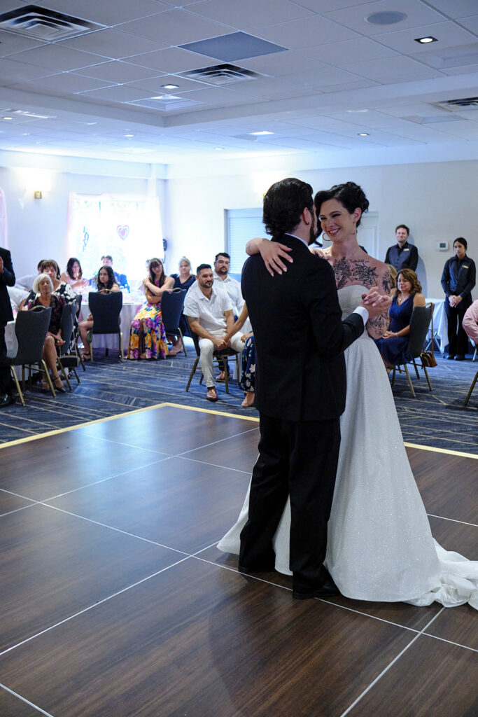 A bride and groom share a dance at Nottawasaga Inn Resort & Conference Centre during their wedding day in Alliston, Ontario.